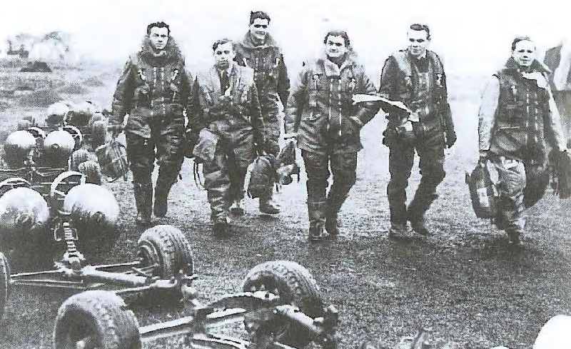 Josef Bernat's crew walking to their aircraft with their kit